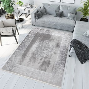 Modern szürke színű szőnyeg keleti mintával fehér színben Szélesség: 120 cm | Hossz: 170 cm