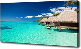 Vászonkép Bungalók a vízparton 100x70 cm