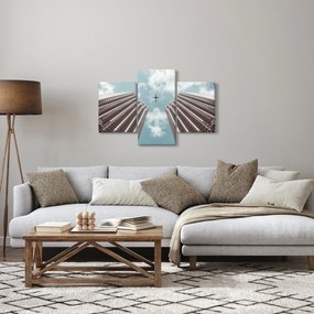 Repülőgép az épületek között képe (90x60 cm)