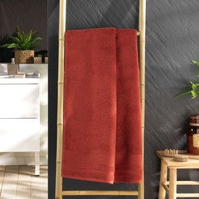Téglavörös frottír pamut fürdőlepedő 70x130 cm Tendresse – douceur d'intérieur