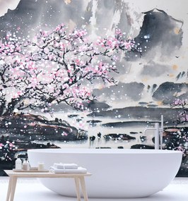 Gario Fotótapéta Virágzó cseresznye, a háttérben a hegyek Anyag: Vlies, Méret: 200 x 200 cm