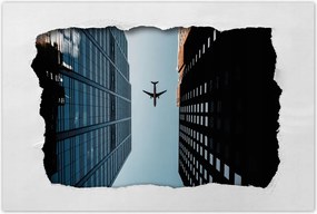 Poszterek 60x40 Repülőgép az épületek között