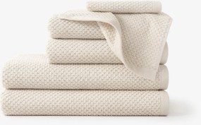 Goldea pamut frotír törölköző / fürdőlepedő micro pure - mandulaszín 50 x 100 cm