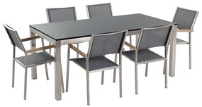Hatszemélyes fekete gránit étkezőasztal szürke textilén székekkel GROSSETO Beliani