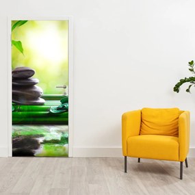 Fotótapéta ajtóra - Masszázs kövek és orchidea a vízen (95x205cm)