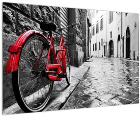 Egy vörös kerék képe egy macskaköves utcán (90x60 cm)