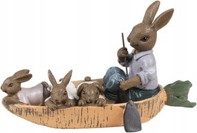 Húsvét egy nyúlcsalád sárgarépából készült hajón