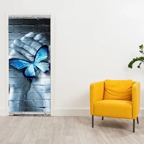 Fotótapéta ajtóra - Kék pillangó a falon (95x205cm)