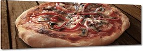 Vászonkép 60x20 Pizza egy fa asztalon