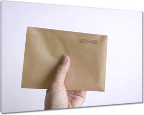 Vászonkép 100x70 Barna boríték a kézben