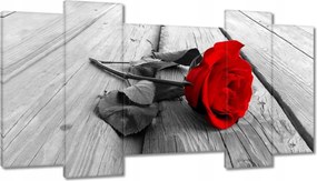 Vászonkép 120x65 Vörös rózsa a deszkákon