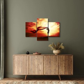 Kép - egy nő sziluettje a naplementében (90x60 cm)