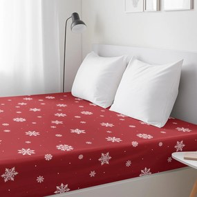 Goldea karácsonyi pamut körgumis lepedő - hópelyhek piros alapon 80 x 200 cm