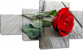 Vászonkép 130x80 Vörös rózsa a deszkákon