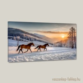 Lovak vágtáznak a téli tájon napnyugtában – Prémium falikép 60x34 cm