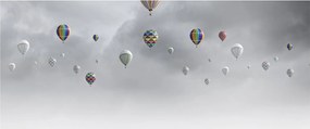 Kép - léggömbök egy téglafal felett (120x50 cm)