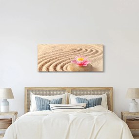 Egy kő, virággal a homokban képe (120x50 cm)
