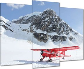 Vászonkép 90x70 Piros repülőgép a hegyekben