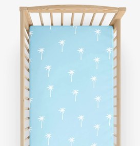 Goldea gyermek körgumis pamut lepedő kiságyba - pálmák pasztell kék alapon 60 x 120 cm
