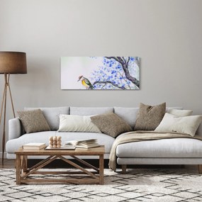 Kép - Madár egy fán kék virágokkal (120x50 cm)
