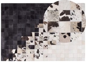 Fekete és fehér bőrszőnyeg 160 x 230 cm KEMAH Beliani
