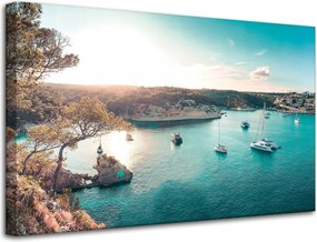Vászonkép Víz a nap tükrében Csónakok Sziklák 80x50 cm