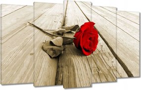 Vászonkép 100x60 Vörös rózsa a deszkákon