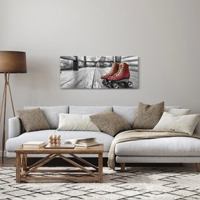 Egy piros régi görgős cipő képe (120x50 cm)