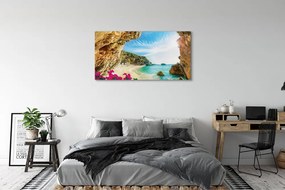 Canvas képek Görögország parti sziklák virágok 125x50 cm