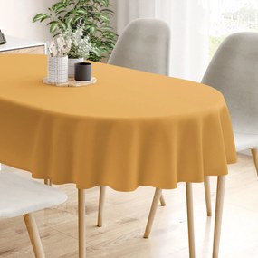 Goldea pamut asztalterítő - mustárszínű - ovális 140 x 180 cm