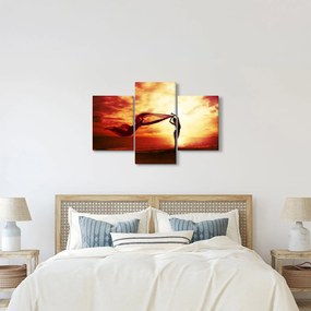Kép - egy nő sziluettje a naplementében (90x60 cm)