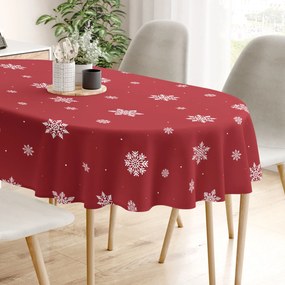 Goldea karácsonyi ovális pamut terítő - hópelyhek piros alapon 140 x 240 cm