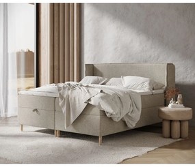 Világosszürke ágyneműtartós boxspring ágy 180x200 cm Monpelli – Maison de Rêve