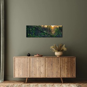 A ragyogó nap képe a fák gallyain keresztül (órával) (90x30 cm)