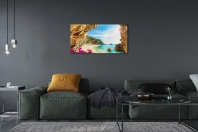 Canvas képek Görögország parti sziklák virágok 125x50 cm
