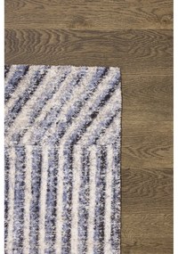 Világoskék gyapjú szőnyeg 200x300 cm Strokes – Agnella