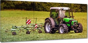 Vászonkép 150x70 Tarktor a szénamezőn