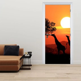 Fotótapéta ajtóra - Zsiráfok naplementekor (95x205cm)