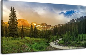 Vászonkép Ösvény a hegyek között Erdő Fák Nap 120x60 cm