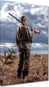Vászonkép 80x120 Vadász fegyver a vállon