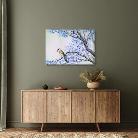 Kép - Madár egy fán kék virágokkal (üvegen) (70x50 cm)