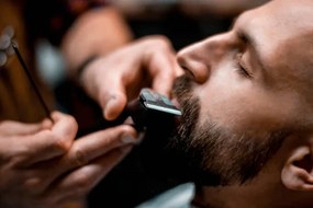 Fotográfia Man getting his mustache shaped by, EXTREME-PHOTOGRAPHER