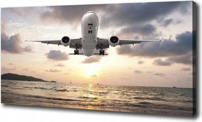 Vászonkép Repülőgép a tengerparton 100x70 cm
