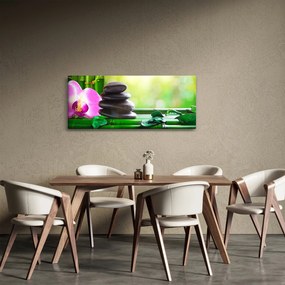 Kép a masszázs kövek és orchideák a vízen (120x50 cm)