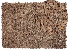 Bézs bőr hosszú szálú szőnyeg 140 x 200 cm MUT Beliani