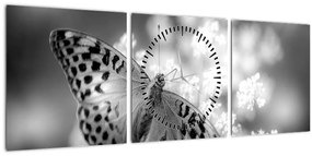 Kép - Részlet egy virágot beporzó pillangóról (órával) (90x30 cm)