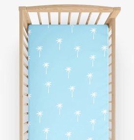 Goldea gyermek körgumis pamut lepedő kiságyba - pálmák pasztell kék alapon 60 x 120 cm