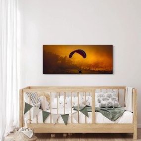 Ejtőernyős a naplementében képe (120x50 cm)