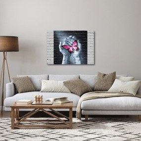 Kép - Rózsaszín pillangó a falon (70x50 cm)