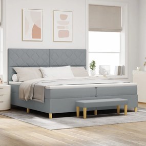 Boxspring ágy matraccal és paddal világosszürke 200x200 cm szövet